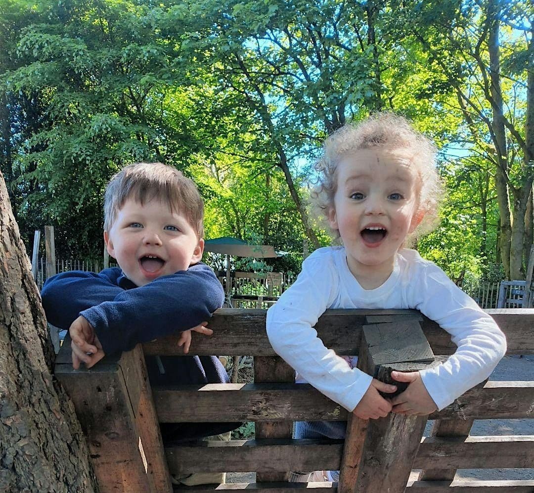 Children sliding down hill